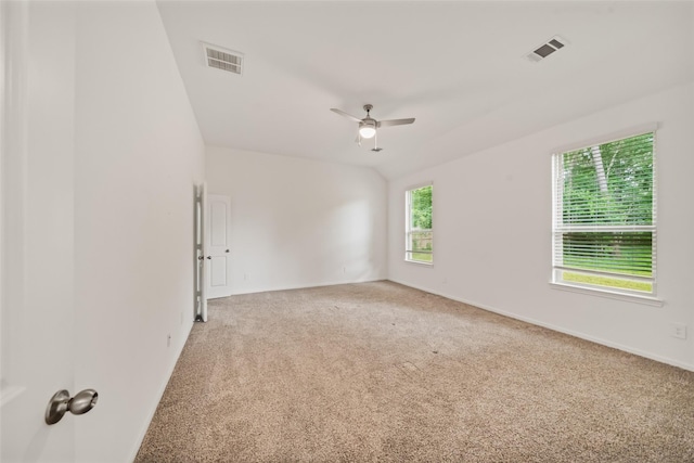 177 Jim Hall Ln, New Waverly, TX 77358 - unfurnished room with light carpet, ceiling fan, and vaulted ceiling