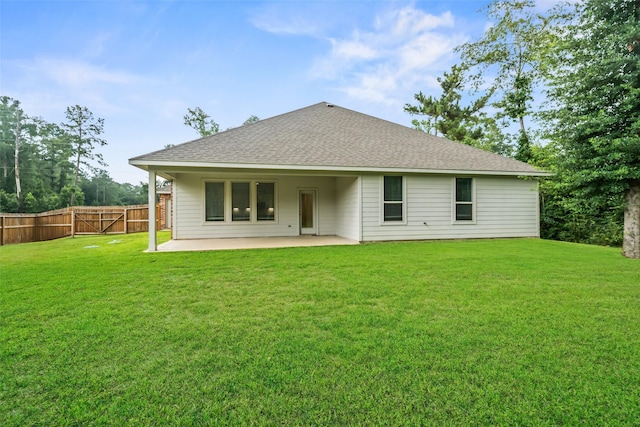 177 Jim Hall Ln, New Waverly, TX 77358 - back of property with a patio and roof with shingles