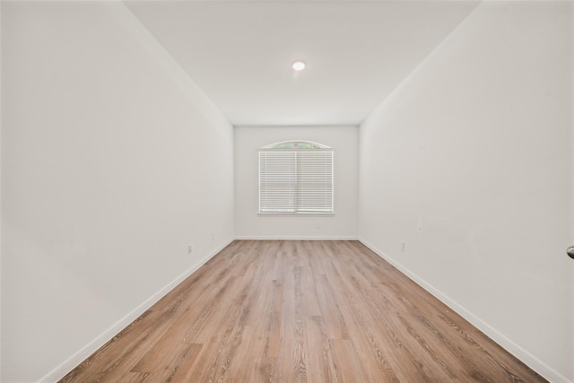 177 Jim Hall Ln, New Waverly, TX 77358 - spare room featuring light wood-style floors and baseboards