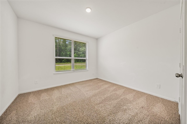 177 Jim Hall Ln, New Waverly, TX 77358 - spare room featuring carpet floors and baseboards
