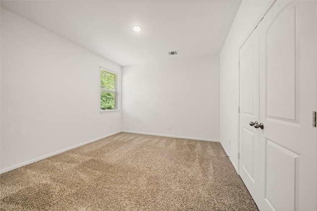 177 Jim Hall Ln, New Waverly, TX 77358 - unfurnished room with light carpet and recessed lighting