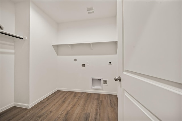 177 Jim Hall Ln, New Waverly, TX 77358 - washroom with hookup for an electric dryer, wood finished floors, hookup for a washing machine, and gas dryer hookup
