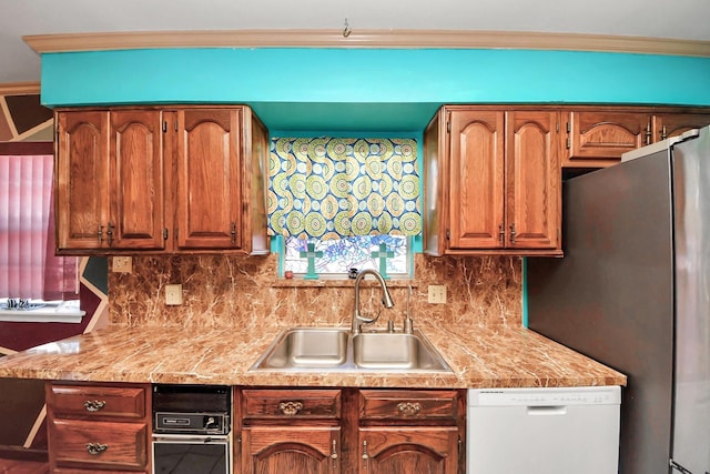 14518 Littleford St, Houston, TX 77045 - kitchen with dishwasher, a sink, freestanding refrigerator, light countertops, and ornamental molding