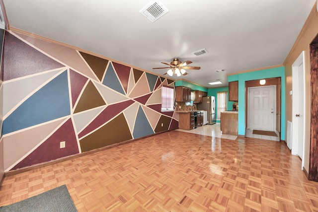 14518 Littleford St, Houston, TX 77045 - unfurnished living room featuring a ceiling fan, baseboards, and crown molding