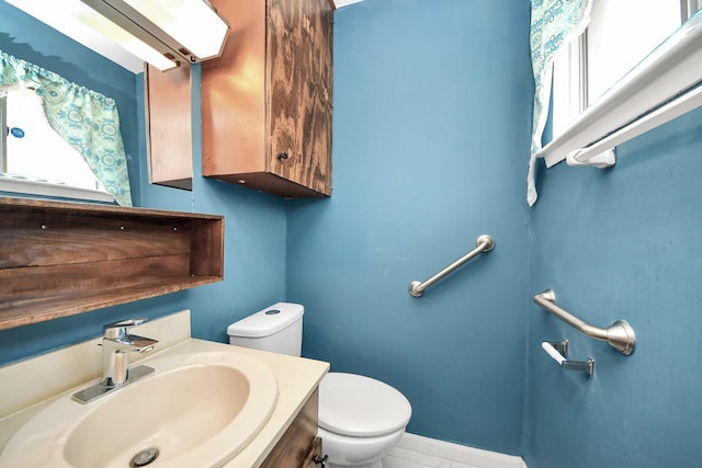 14518 Littleford St, Houston, TX 77045 - bathroom with toilet, healthy amount of natural light, and vanity