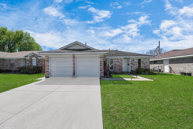 14518 Littleford St, Houston, TX 77045 - ranch-style house featuring a garage, a front yard, concrete driveway, and brick siding