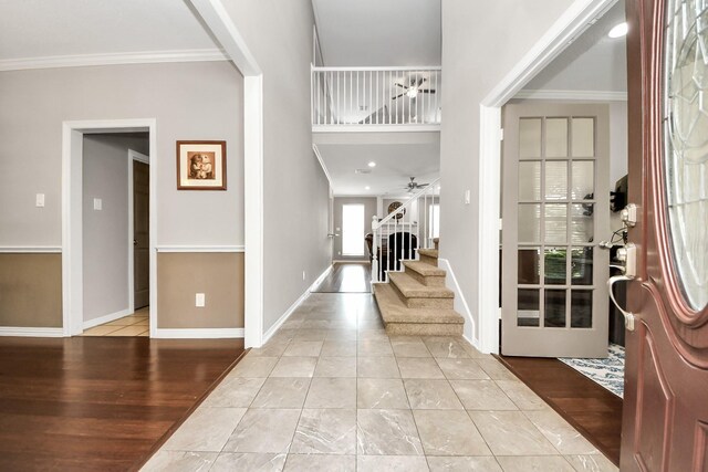 14011 Blazey Dr, Houston, TX 77095 - entryway with ornamental molding, baseboards, and stairs