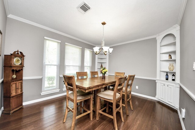 14011 Blazey Dr, Houston, TX 77095 - dining space with a chandelier, dark wood-style flooring, ornamental molding, and baseboards