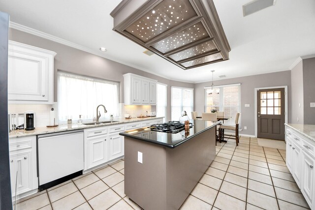14011 Blazey Dr, Houston, TX 77095 - kitchen featuring white dishwasher, a sink, gas stovetop, white cabinetry, and a center island