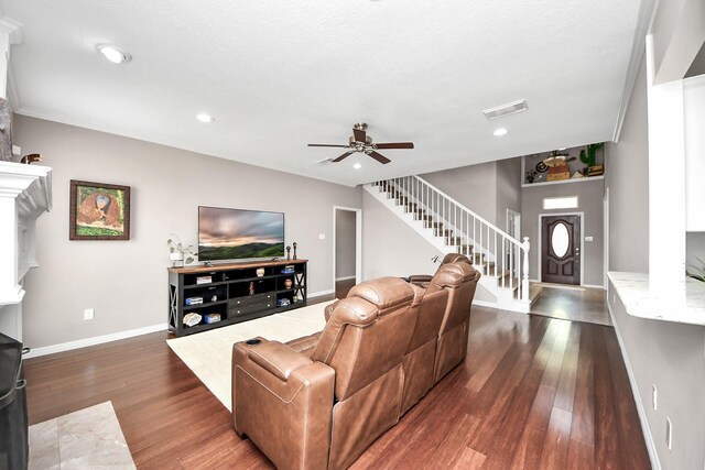14011 Blazey Dr, Houston, TX 77095 - living room with a ceiling fan, dark wood-style floors, baseboards, stairway, and recessed lighting