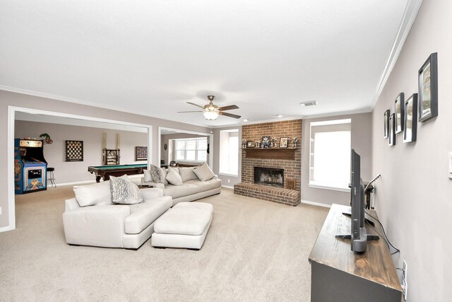 14011 Blazey Dr, Houston, TX 77095 - carpeted living area featuring billiards, a ceiling fan, crown molding, baseboards, and a brick fireplace