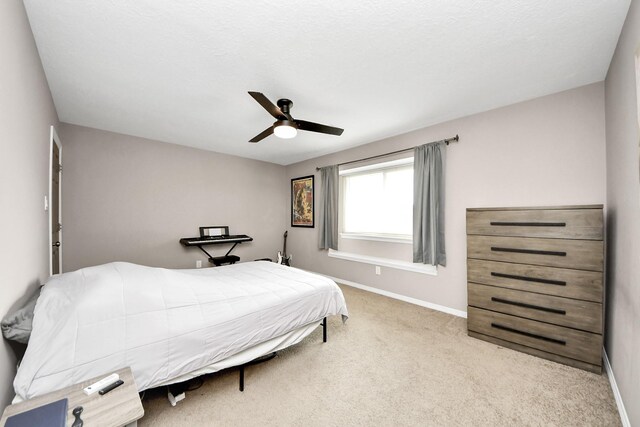 14011 Blazey Dr, Houston, TX 77095 - bedroom with baseboards, carpet, and a ceiling fan