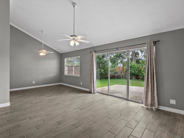 11731 Flushing Meadows Dr, Houston, TX 77089 - spare room featuring lofted ceiling, crown molding, wood finished floors, ceiling fan, and baseboards