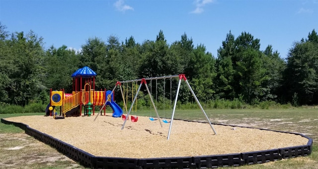 622 Rd 5138, Cleveland, TX 77327 - community play area with a wooded view