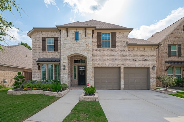 16826 Ellicott Rock Dr, Humble, TX 77346 - view of front of home with driveway, a garage, brick siding, and a front yard