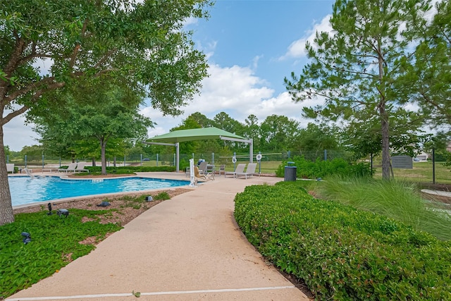 16826 Ellicott Rock Dr, Humble, TX 77346 - community pool with a patio area