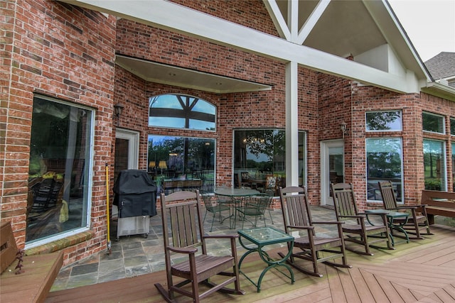 107 Edgewood Dr, Montgomery, TX 77356 - deck with grilling area and outdoor dining area