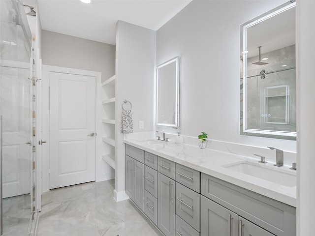 825 Paul Quinn St Unit E, Houston, TX 77091 - full bathroom with double vanity, a shower stall, and marble finish floors