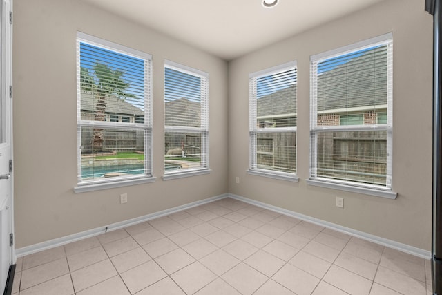 27303 Balson Forest Ln, Spring, TX 77386 - unfurnished room with baseboards, light tile patterned flooring, and recessed lighting