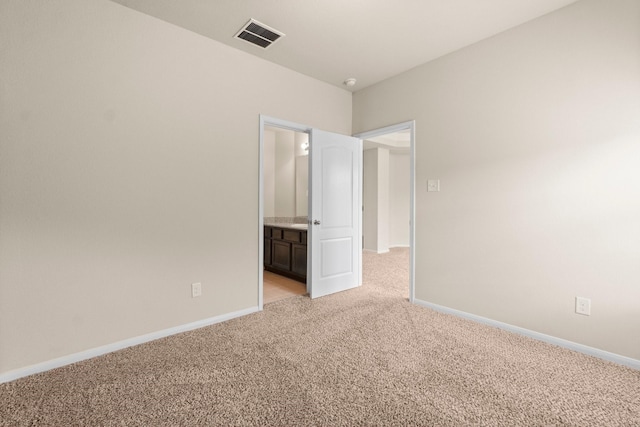 27303 Balson Forest Ln, Spring, TX 77386 - unfurnished bedroom featuring light colored carpet and baseboards
