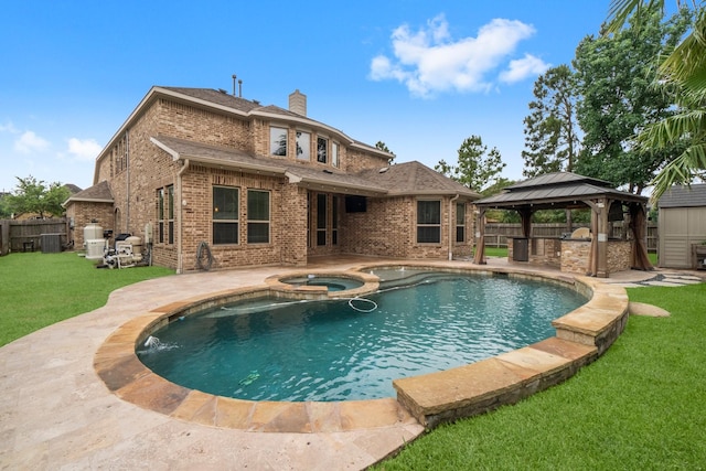 27303 Balson Forest Ln, Spring, TX 77386 - view of pool with a gazebo, a patio area, central air condition unit, and a pool with connected hot tub
