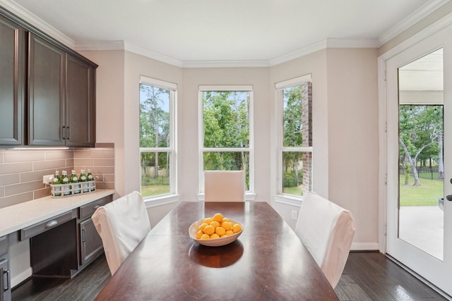 13710 Nubenbrook Lake Dr, Houston, TX 77044 - dining space featuring dark wood-type flooring and ornamental molding