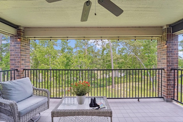 13710 Nubenbrook Lake Dr, Houston, TX 77044 - balcony featuring ceiling fan and view of wooded area