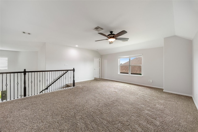 11915 Eagle Ridge Dr, Mont Belvieu, TX 77535 - carpeted empty room with lofted ceiling, ceiling fan, and baseboards