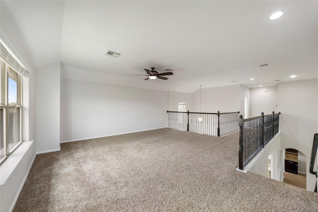 11915 Eagle Ridge Dr, Mont Belvieu, TX 77535 - spare room with carpet, a ceiling fan, recessed lighting, and baseboards