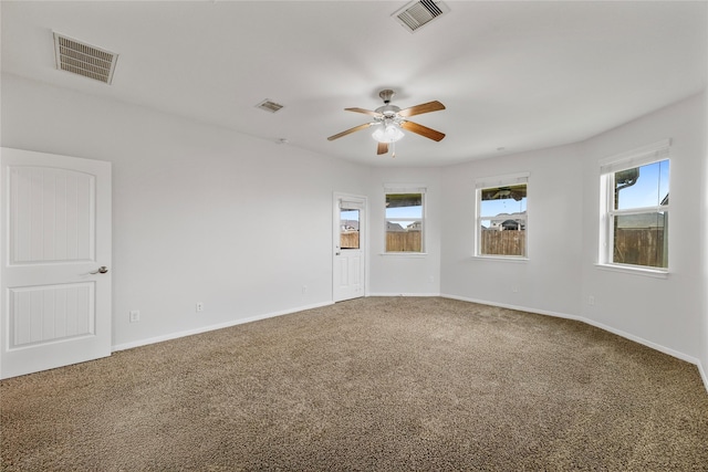 11915 Eagle Ridge Dr, Mont Belvieu, TX 77535 - carpeted spare room featuring ceiling fan and baseboards