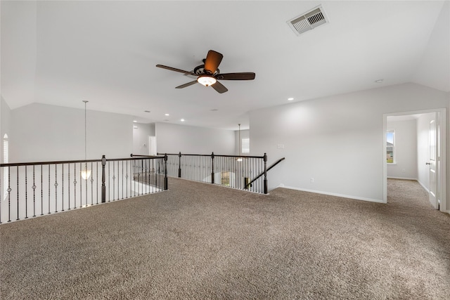 11915 Eagle Ridge Dr, Mont Belvieu, TX 77535 - unfurnished room with vaulted ceiling, ceiling fan, carpet floors, and baseboards