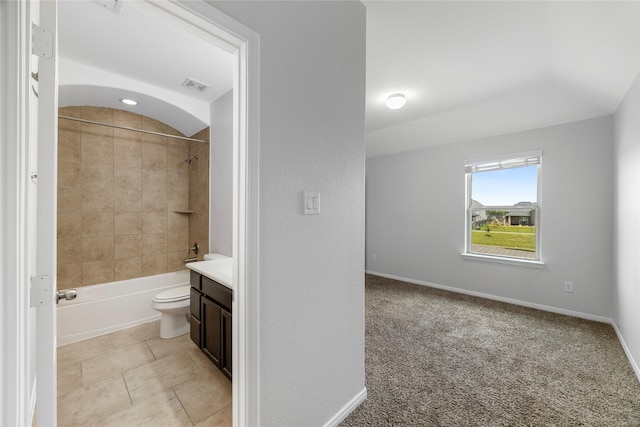 11915 Eagle Ridge Dr, Mont Belvieu, TX 77535 - full bath featuring vanity, toilet, tub / shower combination, and baseboards