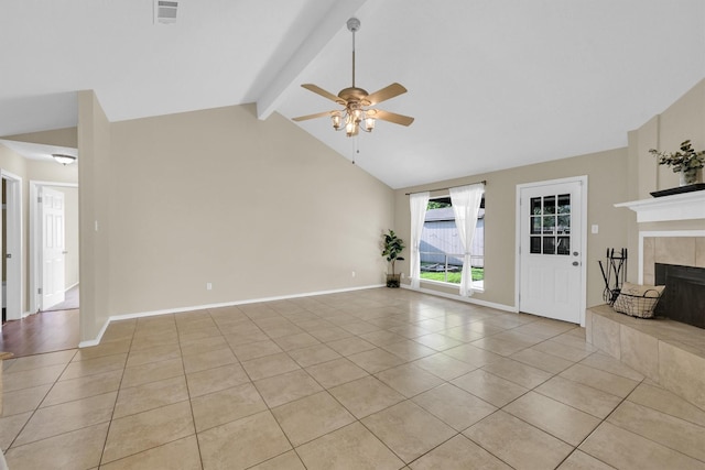 4803 Bridgemont Ln, Spring, TX 77388 - unfurnished living room with a ceiling fan, light tile patterned floors, a fireplace, beam ceiling, and baseboards