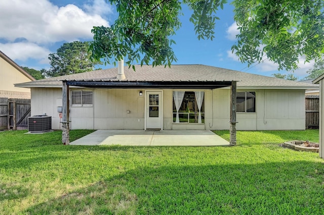 4803 Bridgemont Ln, Spring, TX 77388 - rear view of house with central AC, a patio, an outdoor fire pit, and roof with shingles