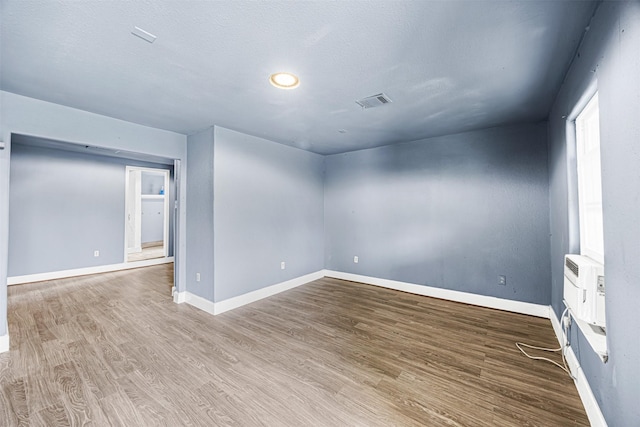 12910 Green River Dr, Houston, TX 77044 - spare room with wood finished floors and baseboards