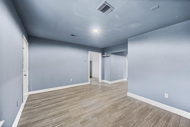 12910 Green River Dr, Houston, TX 77044 - unfurnished room featuring wood finished floors, baseboards, and recessed lighting