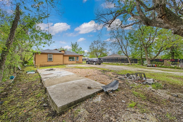 12910 Green River Dr, Houston, TX 77044 - view of yard featuring concrete driveway