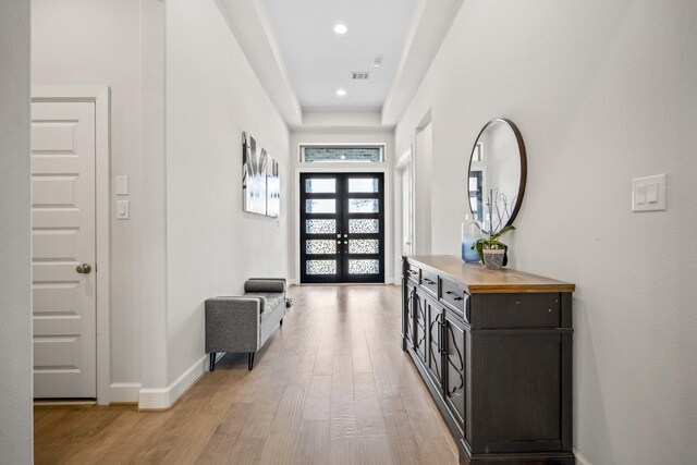 24515 Green Buffalograss Trl, Katy, TX 77493 - entryway with light wood finished floors, baseboards, french doors, and recessed lighting