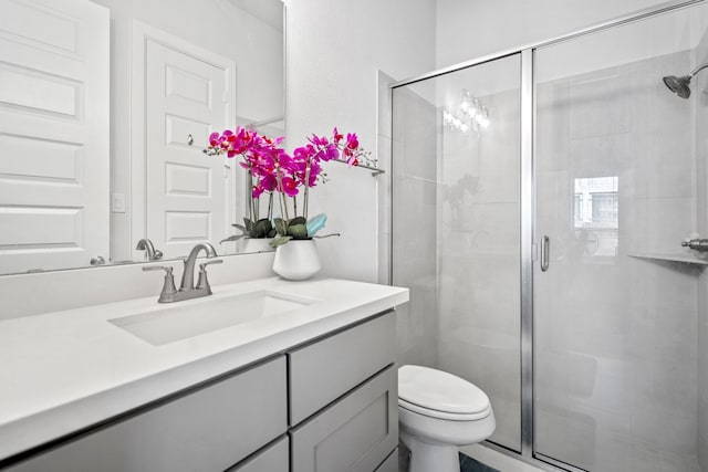 24515 Green Buffalograss Trl, Katy, TX 77493 - bathroom featuring toilet, a shower stall, and vanity
