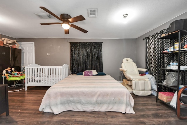 4926 Van Fleet St, Houston, TX 77033 - bedroom featuring wood finished floors and a ceiling fan