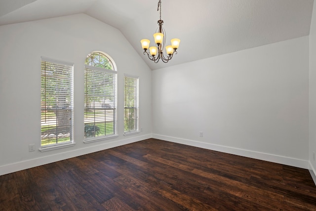20711 Medallion Pointe Dr, Katy, TX 77450 - empty room with a chandelier, lofted ceiling, baseboards, and dark wood-type flooring