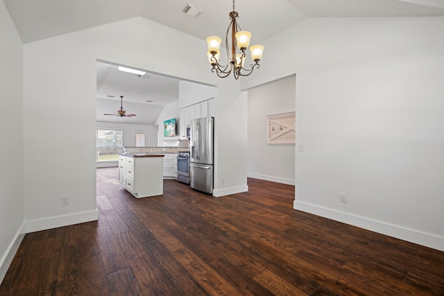 20711 Medallion Pointe Dr, Katy, TX 77450 - kitchen with stainless steel appliances, a ceiling fan, white cabinets, a chandelier, and decorative light fixtures