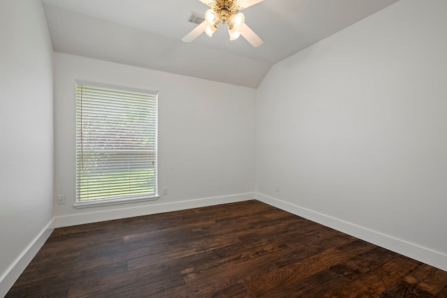 20711 Medallion Pointe Dr, Katy, TX 77450 - spare room with lofted ceiling, ceiling fan, baseboards, and dark wood finished floors
