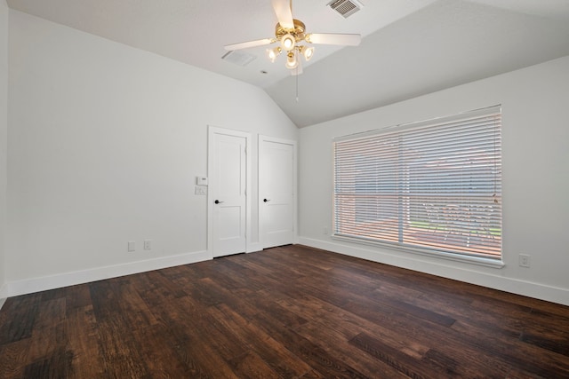 20711 Medallion Pointe Dr, Katy, TX 77450 - spare room with lofted ceiling, dark wood finished floors, baseboards, and a ceiling fan