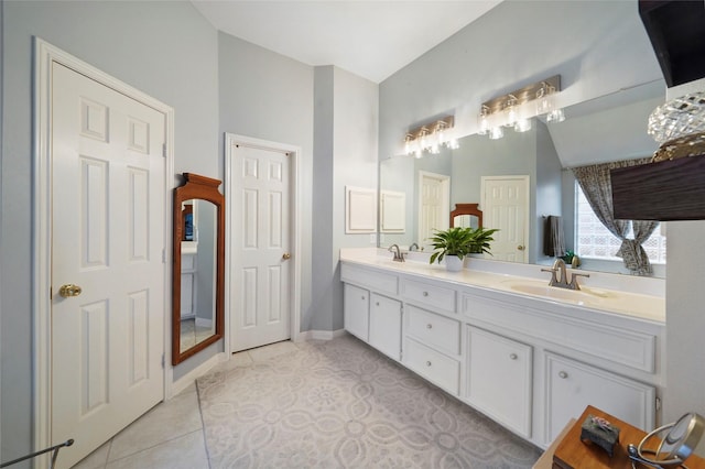 7410 Fall Creek Bnd, Humble, TX 77396 - full bath with double vanity and tile patterned flooring