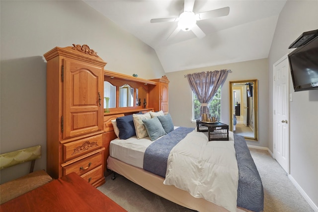 7410 Fall Creek Bnd, Humble, TX 77396 - bedroom featuring light carpet, lofted ceiling, ceiling fan, and baseboards
