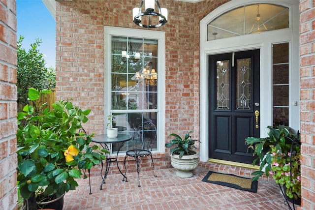 7410 Fall Creek Bnd, Humble, TX 77396 - doorway to property featuring brick siding