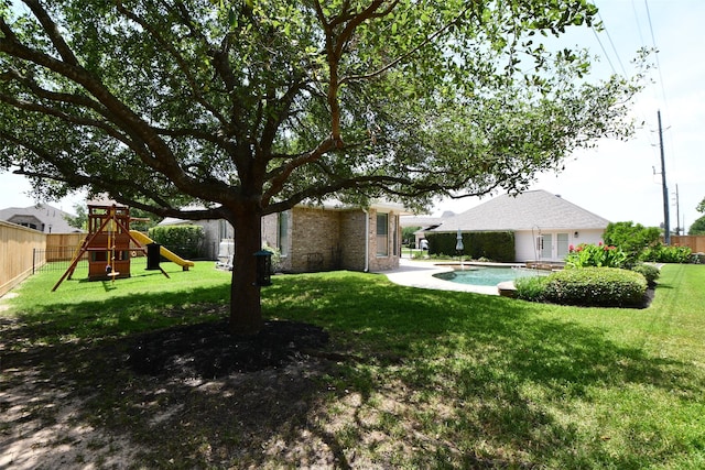 21006 Refuge Creek Dr, Cypress, TX 77433 - view of yard featuring a playground