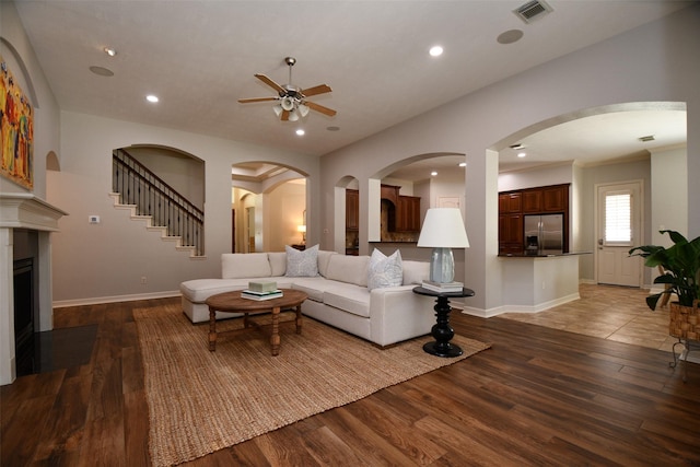 21006 Refuge Creek Dr, Cypress, TX 77433 - living area featuring ceiling fan, wood finished floors, baseboards, recessed lighting, and a fireplace