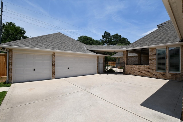 21006 Refuge Creek Dr, Cypress, TX 77433 - view of front of home featuring brick siding and roof with shingles